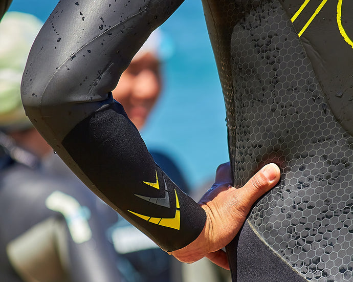 How can you use massage therapy for an athlete to recover better and faster after an Ironman?